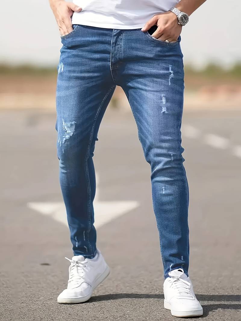 Schmale Herrenjeans Blau Zerrissen
