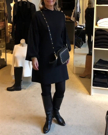 Schwarzes Abendkleid mit Puffärmeln