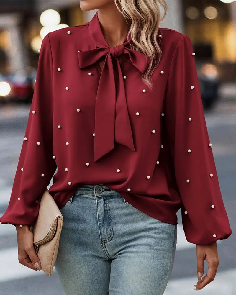 Elegante Kleider | Bänder und Perlen im Chic Stil