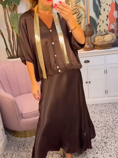 Elegantes Damenkleid mit V-Ausschnitt und Knöpfen