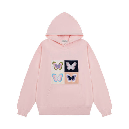 Elegante Frauenkleidung mit Stickerei Schmetterling