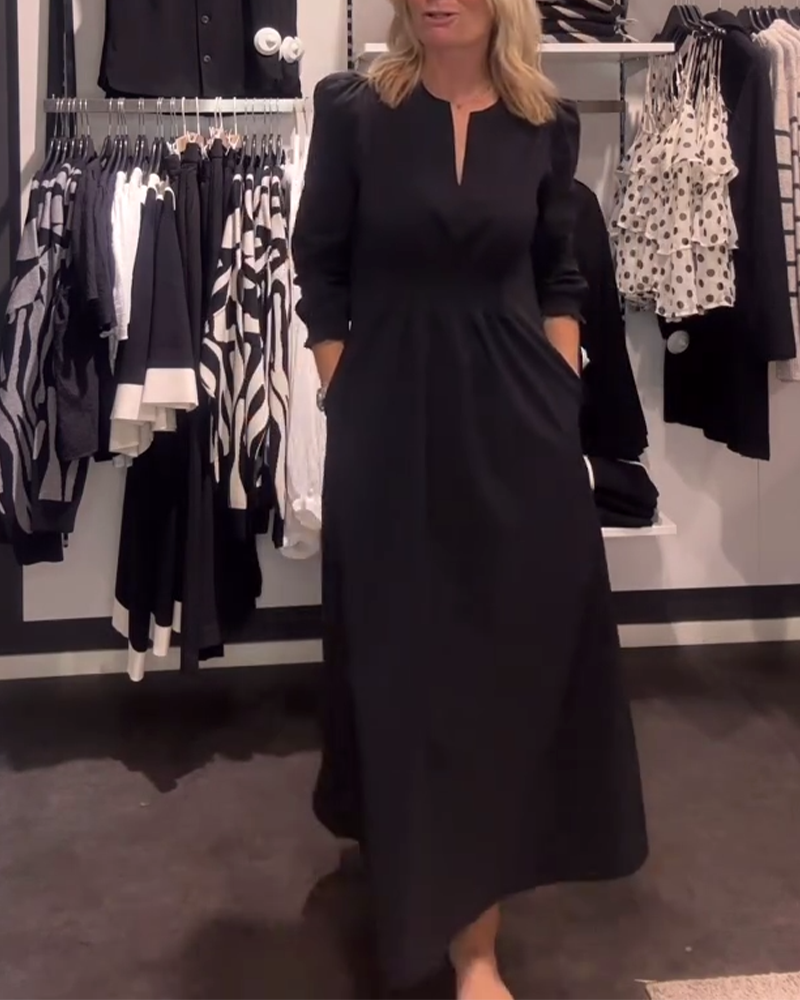 Elegantes Frauenkleid mit Puffärmeln und Taille - IdealeKleiden