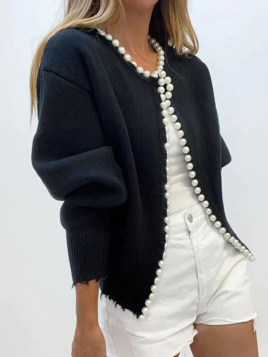 Elegantes Kleid mit Perlen und Rippensaum