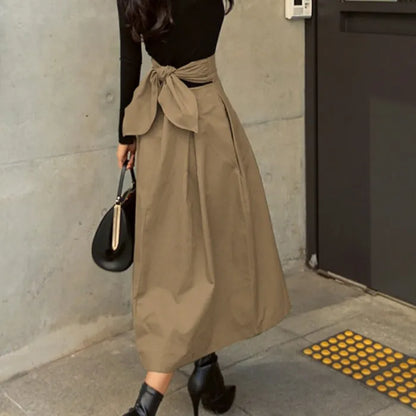 Eleganter Midi Rock mit Hochtailline und Schleife