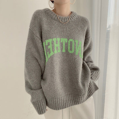 Damen Oversized Pullover Großes Logo Trendy Strickmuster