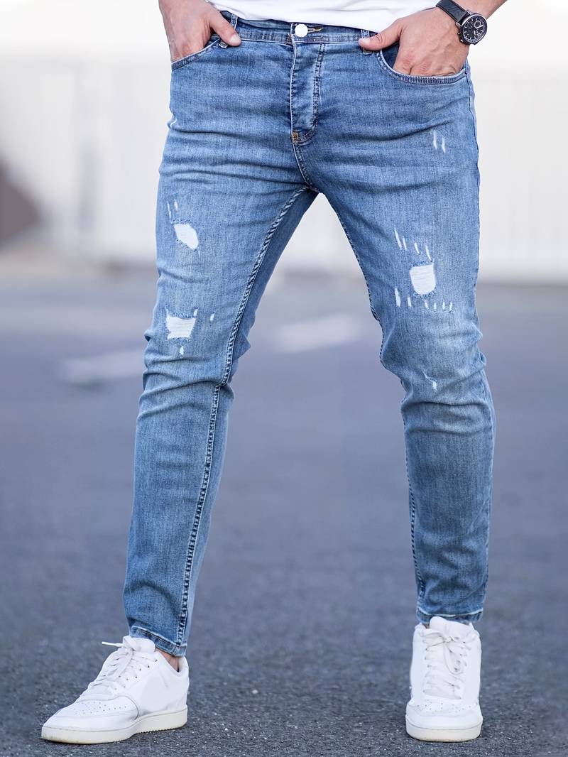 Schmale Herrenjeans Blau Zerrissen