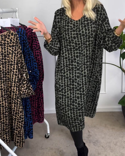 Moderne Damenkleid mit Punkten V-Ausschnitt