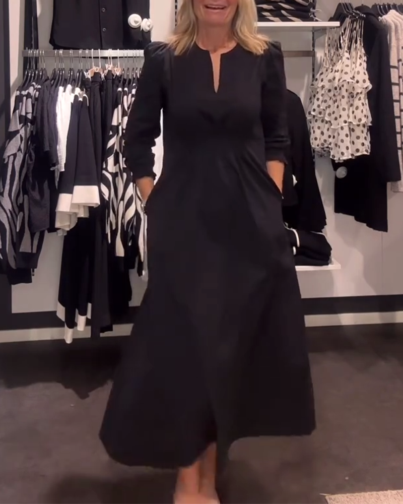 Elegantes Frauenkleid mit Puffärmeln und Taille