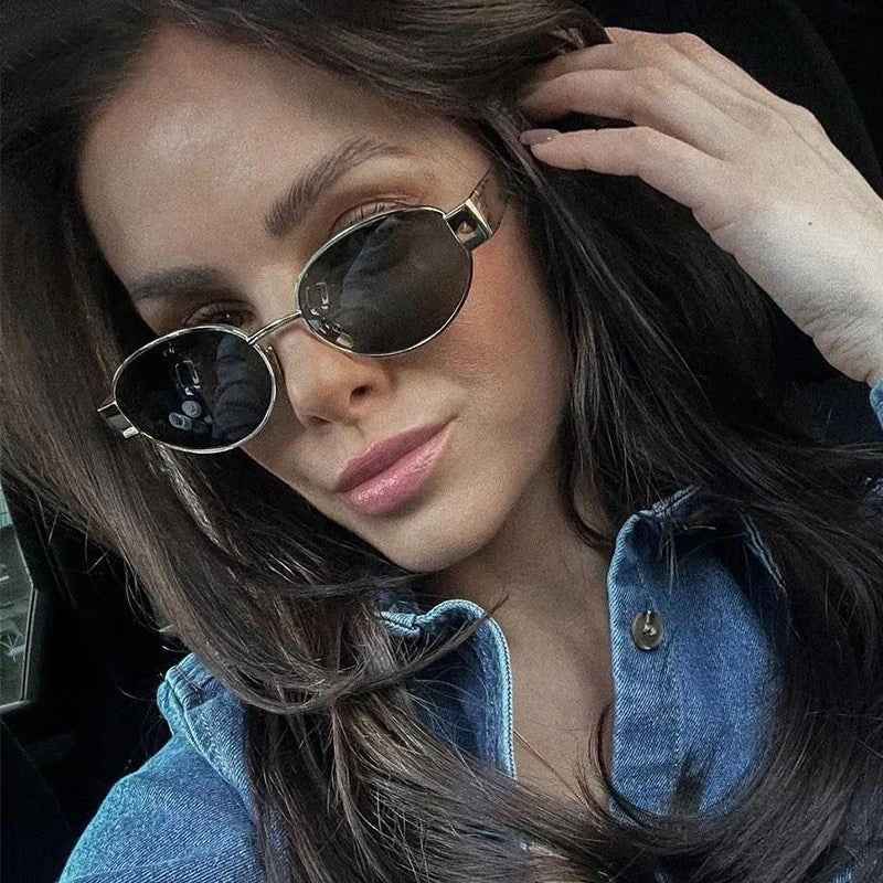 Livia - Elegante Sonnenbrille Oval Silber Akzent