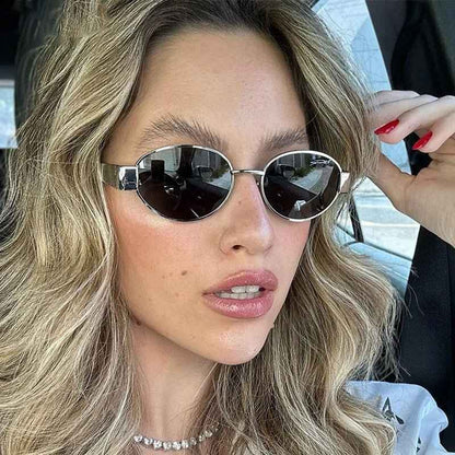 Livia - Elegante Sonnenbrille Oval Silber Akzent